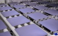 The silicon wafers at a monocrystalline silicon solar cell factory of LONGi Green Energy Technology Co., Ltd. in Xi'an, northwest China's Shaanxi Province.  Photo by Xinhua/Shao Rui.