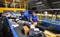 A staff member sorts packages at a logistics center in Taiyuan, north China's Shanxi Province. Photo by Xinhua/Yang Chenguang.