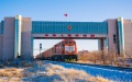 A China-Europe freight train runs through the national gate at Erenhot Port in north China's Inner Mongolia Autonomous Region. Photo by Guo Pengjie/Xinhua.