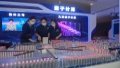 Participants view a quantum computing prototype model during the Quantum Industry Conference in Hefei, east China's Anhui Province. Photo by Xinhua/Han Xu.