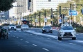 An autonomous vehicle (1st R) is in driverless test on a road in Yizhuang of Beijing, capital of China. Photo by Xinhua/Peng Ziyang.