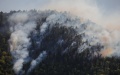 A fire site in the forest area of the central resort town of Borjomi, Georgia. Photo by Tamuna Kulumbegashvili/Xinhua.