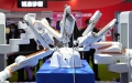 A surgical robot exhibited at the Medtronic booth in the medical equipment and healthcare products exhibition area of the fifth China International Import Expo in east China's Shanghai. Photo by Xinhua/Ding Ting.