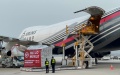 Staff members load freight into a Belgium-bound all-cargo aircraft at the Ezhou Huahu Airport in Ezhou, central China's Hubei Province. Photo by Xinhua/Hu Tao.