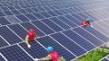 State Grid employees check solar power panels in the Tibet autonomous region. Photo by Song Weixing/Xinhua.