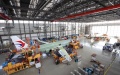 Staff members work at Airbus' Tianjin final assembly line for the A320-family of jets in north China's Tianjin. Photo by Airbus China/Xinhua.