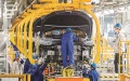 BYD employees work on an assembly line in Xi'an, Shaanxi province. Photo by Xinhua.