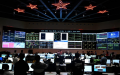 The control center of the experimental advanced superconducting tokamak (EAST) after a successful experiment in Hefei, east China's Anhui Province. Photo by Xinhua/Huang Bohan.