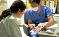 Reception of patients in one of the hospitals in China. Photo by Xinhua.