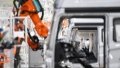 People work at an intelligent plant for manufacturing the FAW Jiefang J7 trucks in Changchun, northeast China's Jilin Province. Photo by Xinhua/Xu Chang.