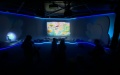People visit a hall showcasing holographic reading technologies for children during the first National Conference on Reading in Beijing, capital of China. Photo by Xinhua/Luo Xin.