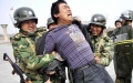 Arrest in China. Photo by Xinhua.