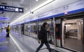 Passengers board Daxing Airport Express at Caoqiao Station in Beijing, capital of China. Photo by Xinhua/Feng Kaihua.