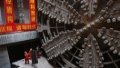 China's longest expressway shield tunnel drilled through. Photo by Xinhua.


