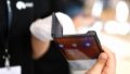 A staff member shows Huawei's 5G foldable Mate X at a press conference in Shenzhen, south China's Guangdong Province. Photo by Xinhua/Mao Siqian.

