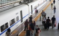 Passengers get on and off a train at Xuzhou East Railway Station in Xuzhou, east China's Jiangsu Province. Photo by Xinhua/Mao Jun.

