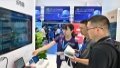 Visitors learn about cloud computer technology at an exhibition on digital technologies at 2023 China Internet Conference in Beijing, capital of China. Photo by Xinhua/Li Xin.


