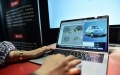 A staff member from a technology company demonstrates an AI software at an exhibition at China Science Fiction Convention (CSFC) in Beijing, capital of China. Photo by Xinhua/Chen Zhonghao.

