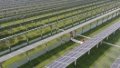 Workers check equipment at a photovoltaic (PV) power station, which combines fish farming and solar power generation, in Zhenwu Town of Yangzhou in east China's Jiangsu Province. Photo by Xinhua/Ji Chunpeng.

