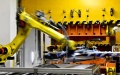 An industrial robot processing auto parts at carmaker ZXAUTO in Rizhao Hi-Tech Industrial Development Zone of Rizhao City, east China's Shandong Province. Photo by Xinhua/Guo Xulei.

