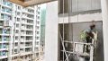 A worker at the construction site of a residential area in Jiangdong New Area of Haikou, south China's Hainan Province. Photo by Xinhua/Yang Guanyu.