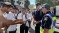 Restrictions and enhanced security measures introduced in Uman due to arrival of Hasidim. What is prohibited