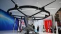 People view an AR-300 aerial vehicle at the 6th China Helicopter Exposition in north China's Tianjin Municipality. Photo by Xinhua/Zhao Zishuo.
