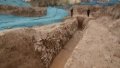 A ditch of the water system in the ruins of a city from the Shang Dynasty (1600-1046 B.C.) in Zhengzhou, capital of central China's Henan Province. Photo by Xinhua.