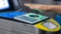 A passenger has his palm scanned before entering a subway station in Beijing, capital of China. Photo by Beijing Municipal Commission of Transport/Handout via Xinhua.