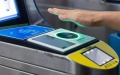 A passenger has his palm scanned before entering a subway station in Beijing, capital of China. Photo by Beijing Municipal Commission of Transport/Handout via Xinhua.