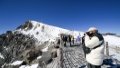 People visit snow-covered Changbai Mountain in northeast China's Jilin Province. Photo by Xinhua/Yan Linyun.
