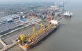 China to further ease foreign ownership restrictions. Photo by Xinhua.