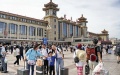 Passengers are seen at the square in front of Beijing Railway Station in Beijing, capital of China. Photo by Xinhua/Li Xin.