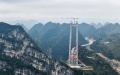 The construction site of the Huajiang grand canyon bridge in southwest China's Guizhou Province. Photo by Xinhua/Yang Wenbin.