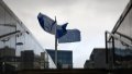 EU flags are seen outside the European Commission in Brussels, Belgium. Photo by Xinhua/Zheng Huansong.