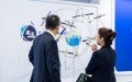 Visitors look at an exhibit during the second International Summit on BeiDou Navigation Satellite System (BDS) Applications in Zhuzhou, central China's Hunan Province. Photo by Xinhua/Chen Sihan.