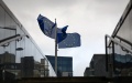EU flags are seen outside the European Commission in Brussels, Belgium. Photo by Xinhua/Zheng Huansong.