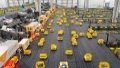 Robots sorting and conveying parcels at an intelligent logistics center in Deqing County, east China's Zhejiang Province. Photo by Ni Lifang/Xinhua.