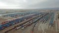 Cargo trains waiting for departure at the Alataw Pass in northwest China's Xinjiang Uygur Autonomous Region. Located in the Mongolian Autonomous Prefecture of Bortala in Xinjiang, the Alataw Pass borders Kazakhstan. Photo by Xinhua/Li Xin.