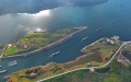 Ships passing the ship lock of the Dateng Gorge Water Conservancy project in Guiping City, south China's Guangxi Zhuang Autonomous Region. Photo by Xinhua/Zhou Hua.