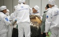 Scientific researchers prepare to take out the container loaded with moon samples from the returner of Chang'e-5 probe in Beijing, capital of China. Photo by Xinhua/Jin Liwang.