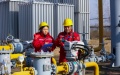 Staff members record data at a gas supply station of a natural gas company in Guangshan County of Xinyang City, central China's Henan Province. Photo by Xie Wanbai/Xinhua.