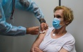 Revaccinating elderly against COVID-19. Photo by WHO/Khaled Mostafa.