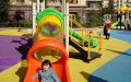 Kids play at a renovated square in a community in Yanta District of Xi'an, northwest China's Shaanxi Province. Photo by Xinhua/Shao Rui.
