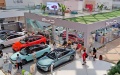 Consumers inspect BYD's NEV models at a shopping mall in Beijing Chaoyang district. Photo by Xinhua.