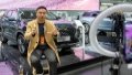 A man performs livestreaming during an automobile exposition at the Changsha International Convention and Exhibition Center in Changsha, central China's Hunan Province. Photo by Xinhua/Chen Sihan.