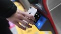 A passenger scans a QR code of Alipay, a mobile payment app, to take subway at the Fengtan Road Subway Station in Hangzhou, capital of east China's Zhejiang Province. Photo by Xinhua/Huang Zongzhi.