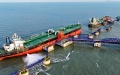 Two huge oil tankers at a crude oil terminal of the Yantai Port in Yantai, east China's Shandong Province. Photo by Xinhua/Guo Xulei.