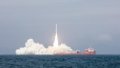 A Smart Dragon-3 (SD-3) carrier rocket carrying nine satellites blasts off from waters off the coast of Yangjiang, a city in south China's Guangdong Province. Photo by An Di/Xinhua.
