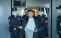 A fugitive surnamed Liu is repatriated to China from Indonesia after 11 years on the run. Photo by Ministry of Public Security/Xinhua.